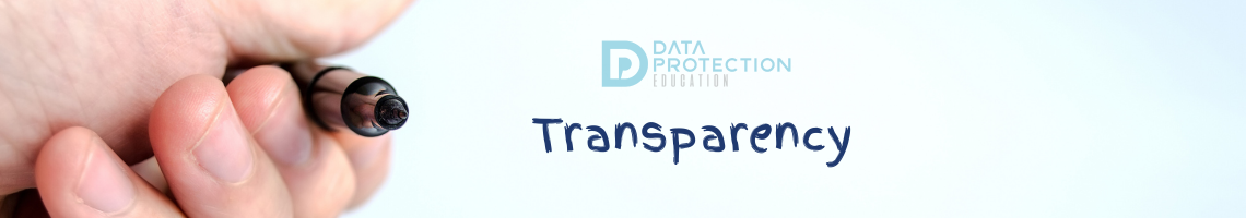 Transparency written in pen, with the Data protection education logo above, a hand holding a pen on the left and a reflection of the hand below it