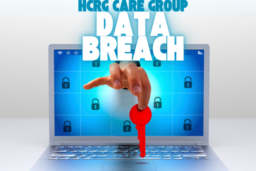 Text: HCRG Data Breach. Photo of a hand coming out of a laptop holding a red key