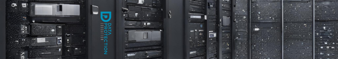 Black and white server room with Data Protection education in blue writing on one of the doors.