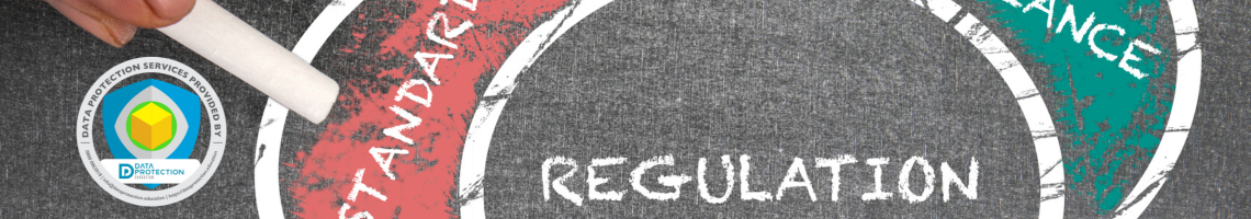 The words standard, regulation, compliance and law in a venn diagram made of chalk written on tarmac.  A hand holding some chalk. Data Protection Education's DPO badge.
